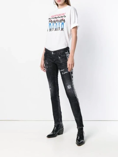 Shop Dsquared2 Distressed Logo-stripe Jeans In Black