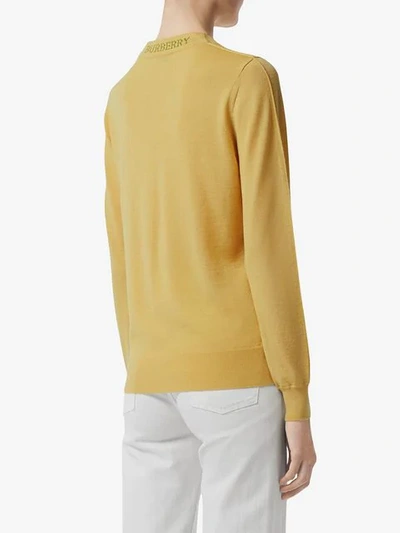 Shop Burberry Logo Detail Merino Wool Sweater In Yellow