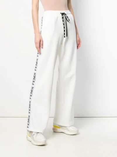 Shop Fendi Flared Logo Jogging Trousers In White