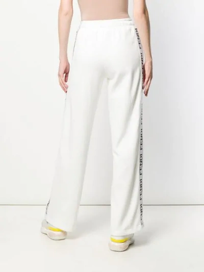 Shop Fendi Flared Logo Jogging Trousers In White