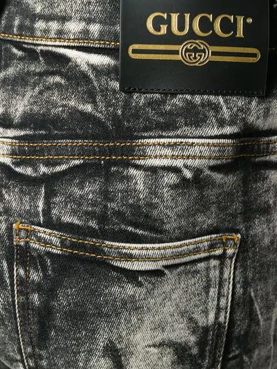Shop Gucci Acid Wash Slim-fit Jeans In Black