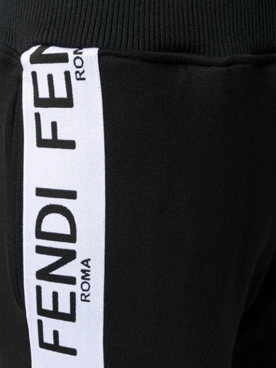 Shop Fendi Roma/amor Logo Tape Track Pants In Black