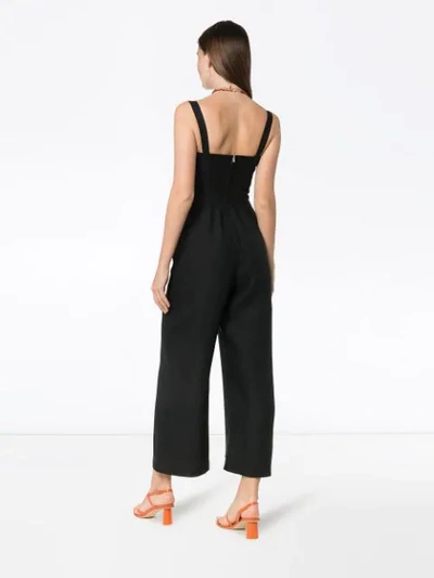 Shop Reformation Kass Button Jumpsuit In Black