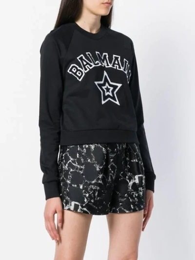 Shop Balmain Sweatshirt Mit Print - Schwarz In Black