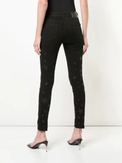 Shop Stella Mccartney Star Print Skinny Jeans In Black