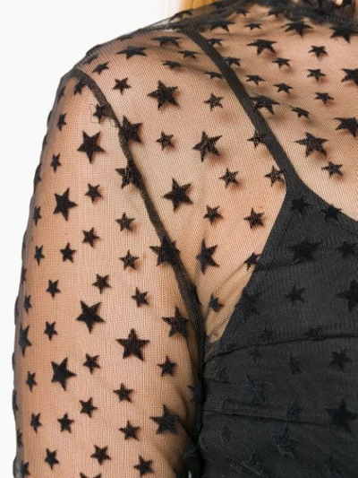 transparent star print blouse