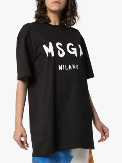 Shop Msgm Logo Print Oversized Cotton T-shirt In Black