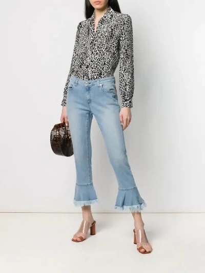 Shop Michael Michael Kors Fringed Hem Jeans In Blue