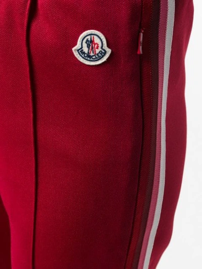 Shop Moncler Slim Side Stripe Joggers In Red