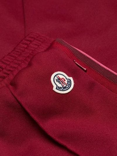 Shop Moncler Slim Side Stripe Joggers In Red