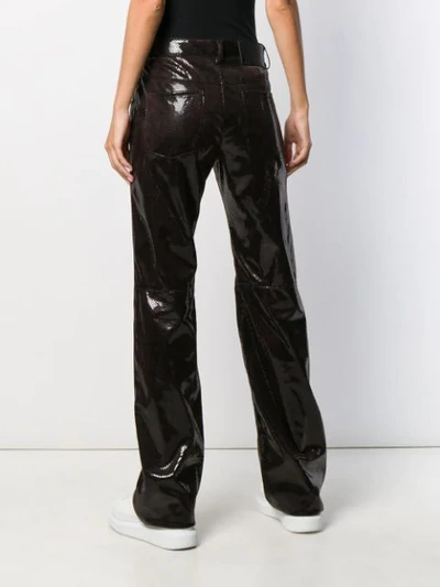 Shop Msgm Python Print Trousers In Brown