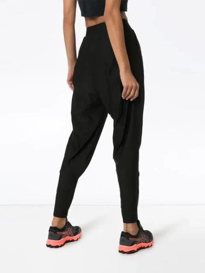 Shop Charli Cohen Saber Matte Tapered Trousers In Black