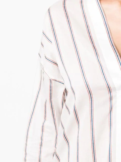 striped V-neck shirt
