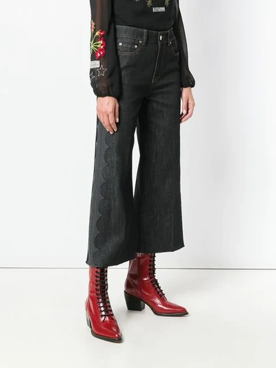 Shop Red Valentino Cropped Flared Jeans In Black