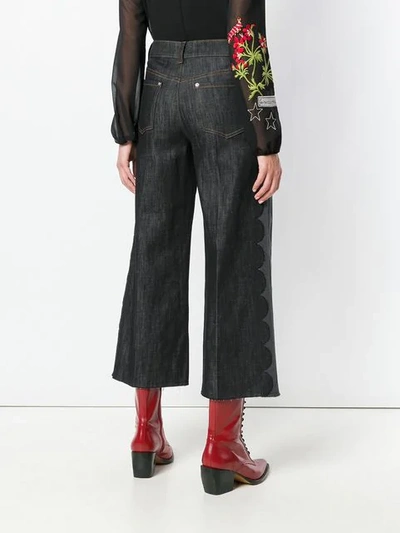 Shop Red Valentino Cropped Flared Jeans In Black