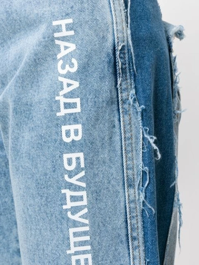 Shop Natasha Zinko Cropped Flare Jeans In Blue