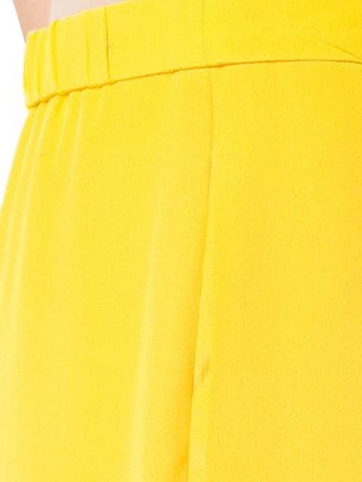 Shop Emilio Pucci High-waisted Flared Trousers In Yellow