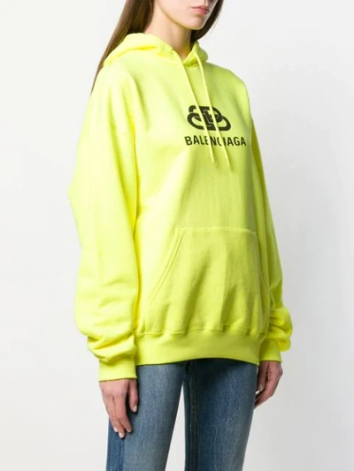 Shop Balenciaga Back Pulled Hoodie In Yellow