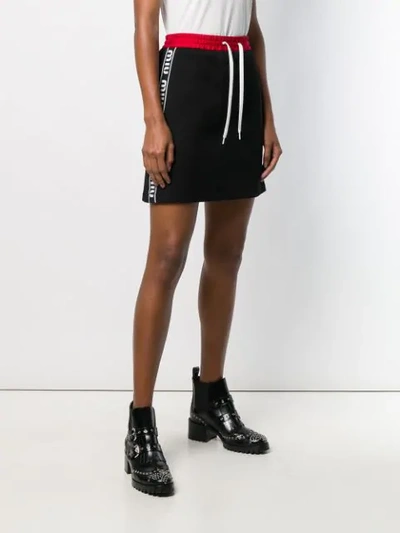 Shop Miu Miu Logo Stripe Mini Skirt In Black