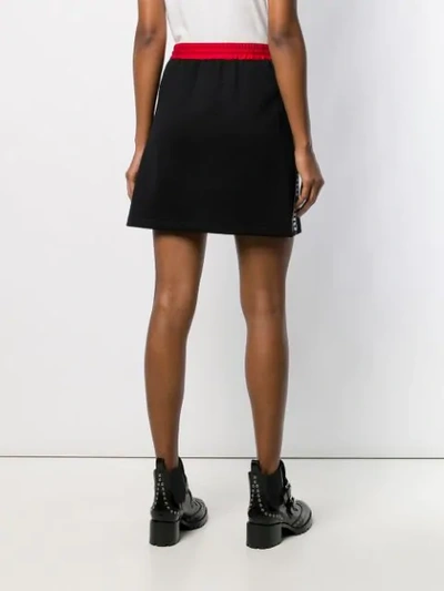Shop Miu Miu Logo Stripe Mini Skirt In Black