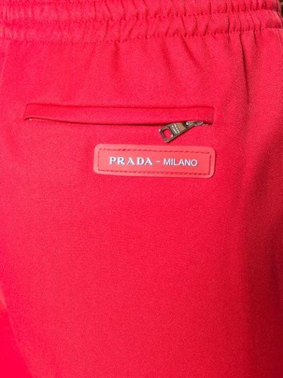 Shop Prada Flared Leg Track Pants In Red
