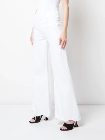 Shop Mother The Tomcat Roller Chew Jeans In White