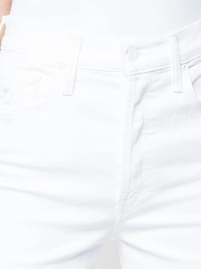 Shop Mother The Tomcat Roller Chew Jeans In White