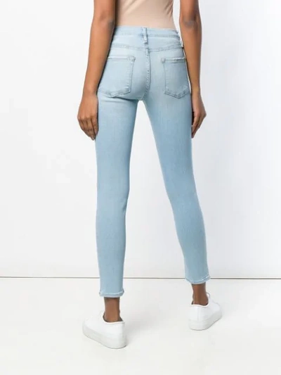 Shop Frame Classic Ankle Skinny Jeans In Blue