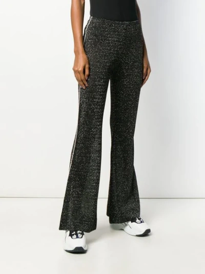 Shop Acne Studios Metallic Threading Flared Trousers In 900-black