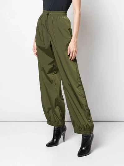 Shop Monse Snaps Detail Parachute Trousers In Green