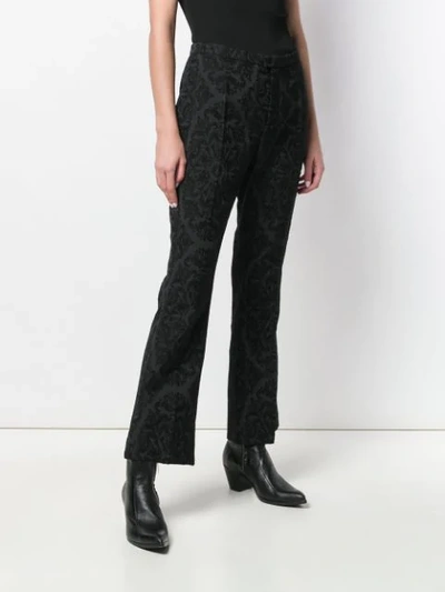 Shop Saint Laurent Jacquard Flared Trousers In Black