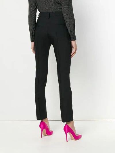 Shop Valentino High-waisted Trousers In Black