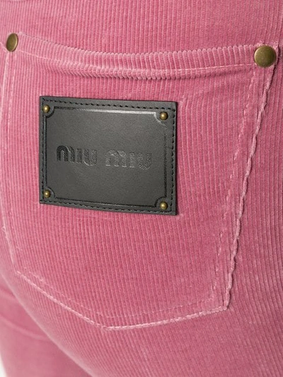 Shop Miu Miu Flared Cropped Corduroy Trousers In Pink