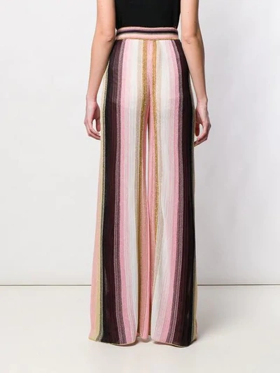 Shop Missoni Striped Knit Flared Trousers In Pink