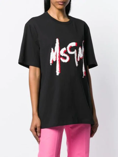 Shop Msgm Oversized Logo T-shirt In Black