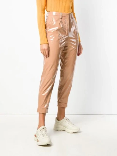 high-waisted shine effect trousers