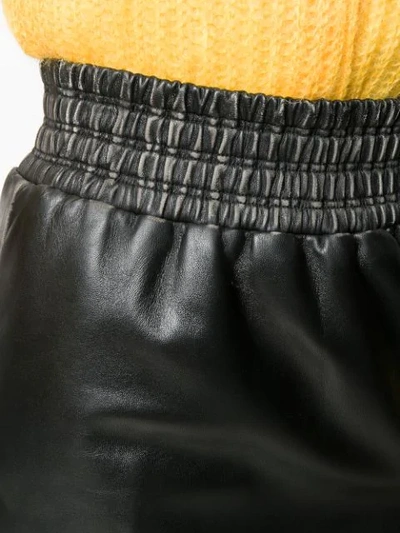 Shop Miu Miu Biker Flared Mini Skirt - Black
