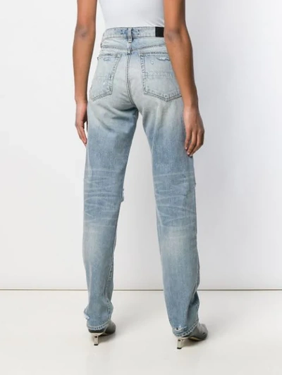 Shop Amiri Slouch Distressed Effect Jeans In Blue