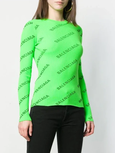 Shop Balenciaga Allover Logo Sweater In Green