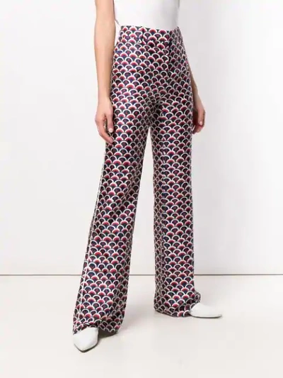 Shop Valentino Scalloped Logo Print Trousers In Blue