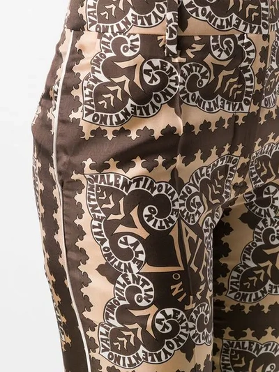 Shop Valentino Bandana Print Trousers In Neutrals
