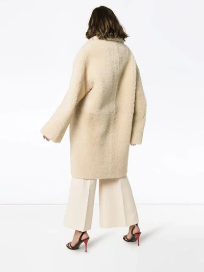 Shop Bottega Veneta Reversible Shearling Mid-length Coat In Neutrals