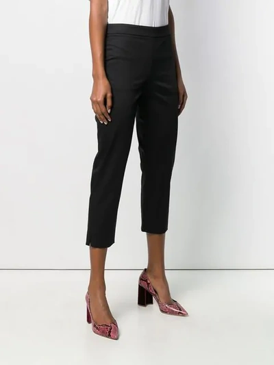 Shop Moschino Cropped Tailored Trousers In Black