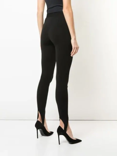 Shop Givenchy Skinny Stirrup Trousers In Black