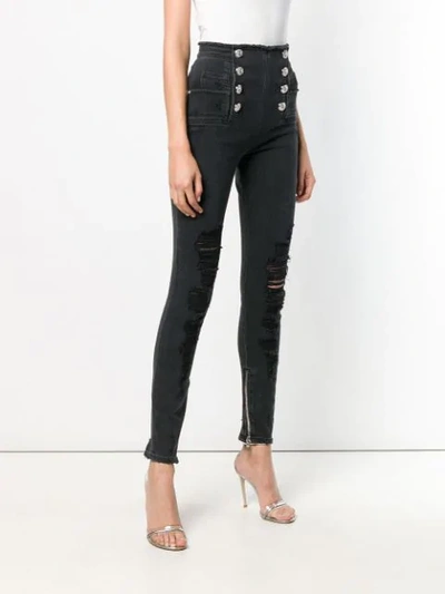 Shop Balmain Destroyed Skinny Jeans In Black