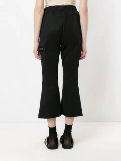 Shop À La Garçonne Cropped Flared Trousers In Black