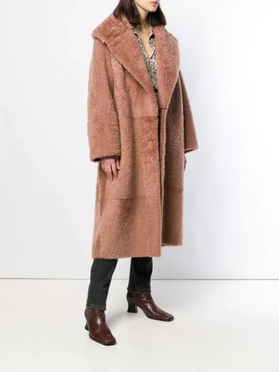 Shop Cara Mila Gigi Oversized Shearling Coat In Terracota