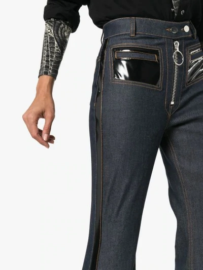 Shop Ellery Pedestrian Pvc Pocket Flared Jeans - Blue