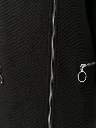 Shop Moschino Mock Neck Zipped Coat In Black