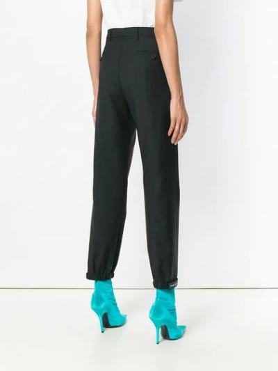 Shop Prada High Waist Tapered Trousers In Black